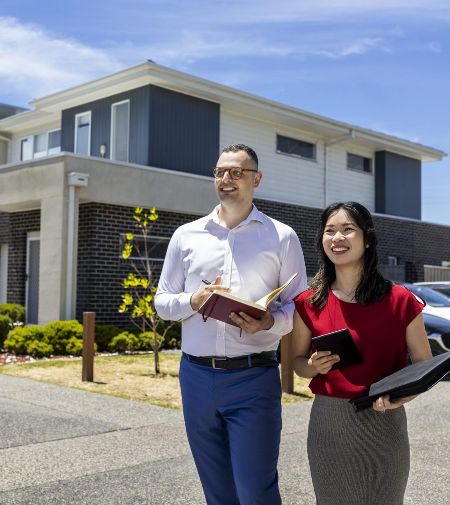 Body corporate managers conducting site inspection at townhouse estate