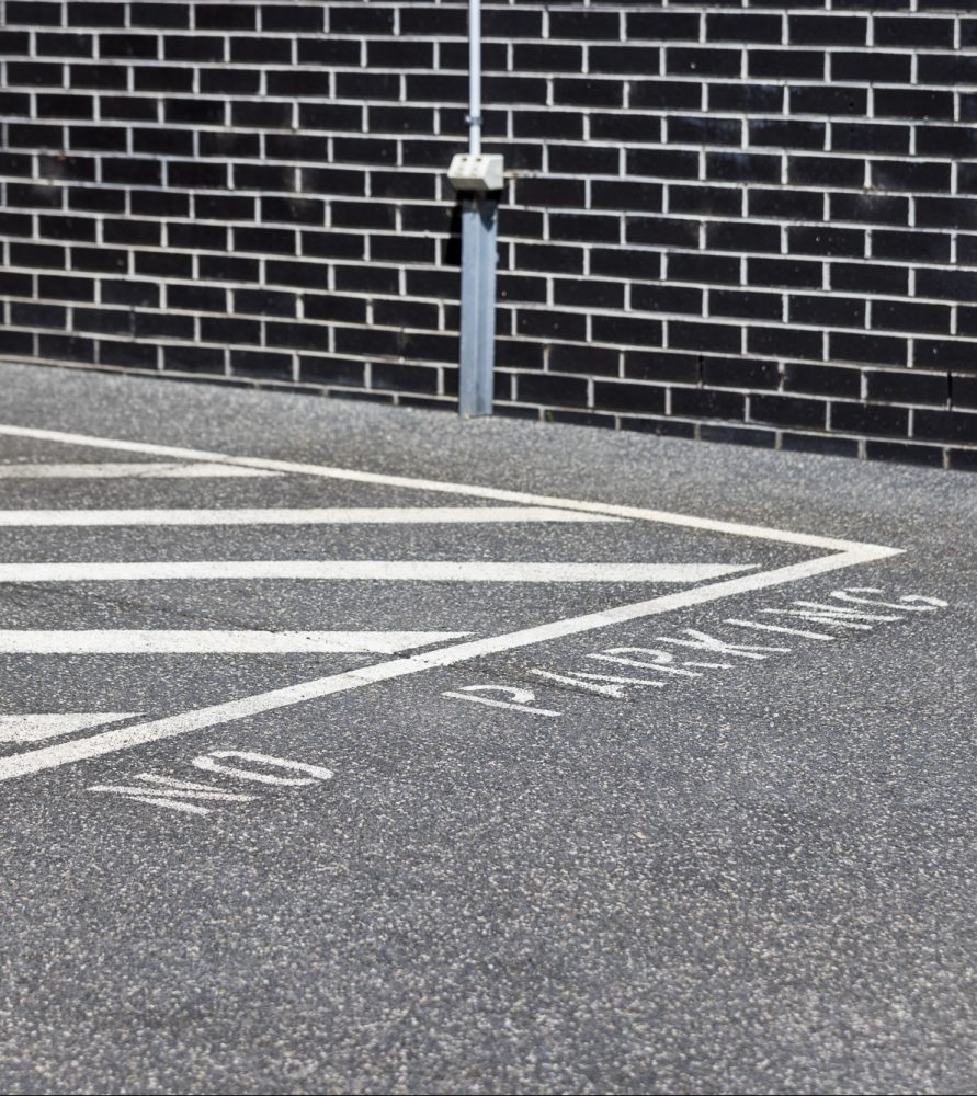 Line marking on common property in townhouse estate to prevent parking issues