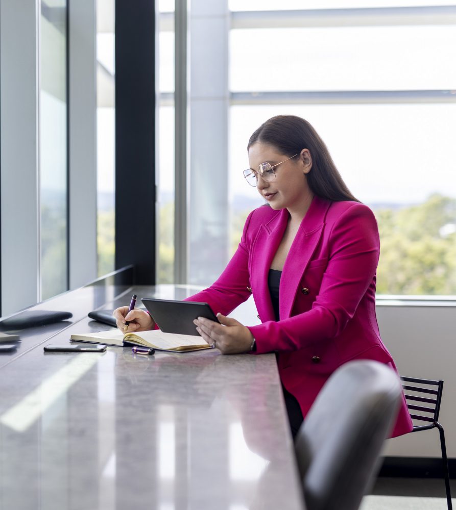 Body corporate manager reviewing email from townhouse owners