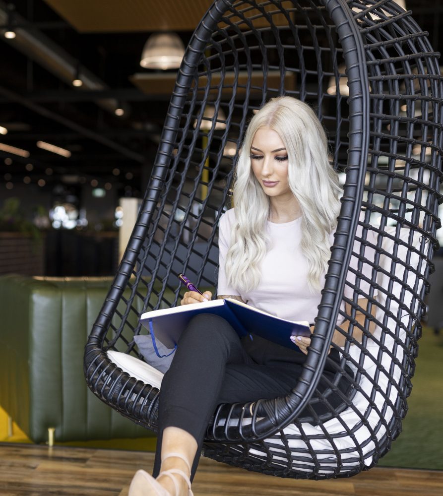 Body corporate manager preparing notes for annual general meeting