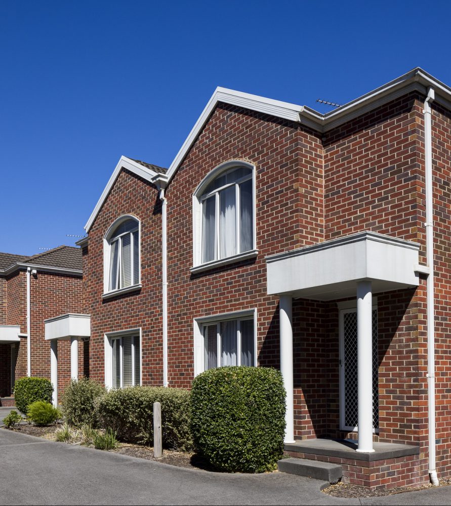 Townhouse body corporate with well-maintained common garden areas