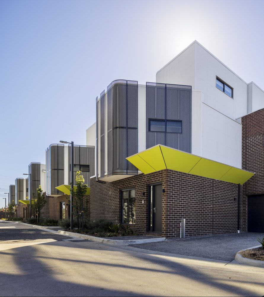 Body corporate townhouse estate with driveway and common garden areas