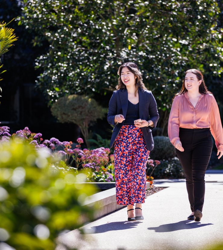 Two strata managers inspecting gardens