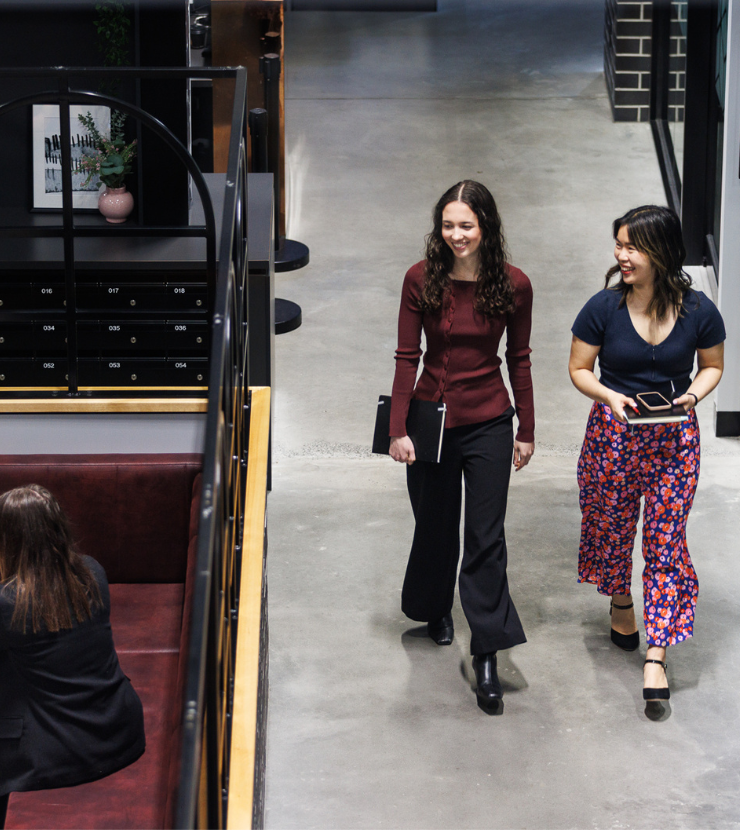 Strata managers walking to a meeting with clients
